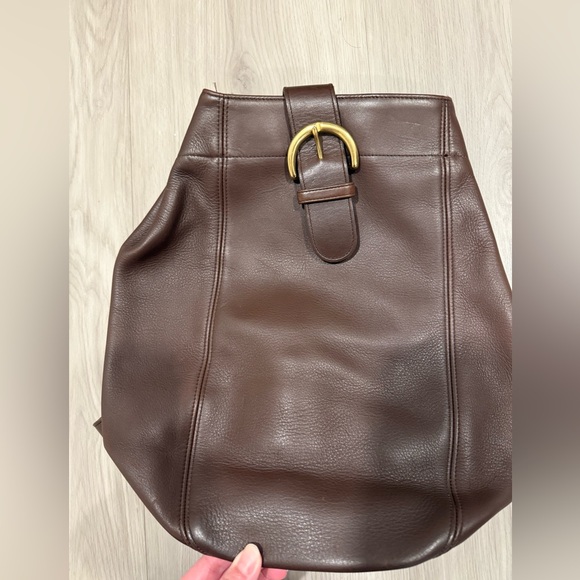 Coach Handbags - Coach vintage Brown Leather buckle Sling backpack